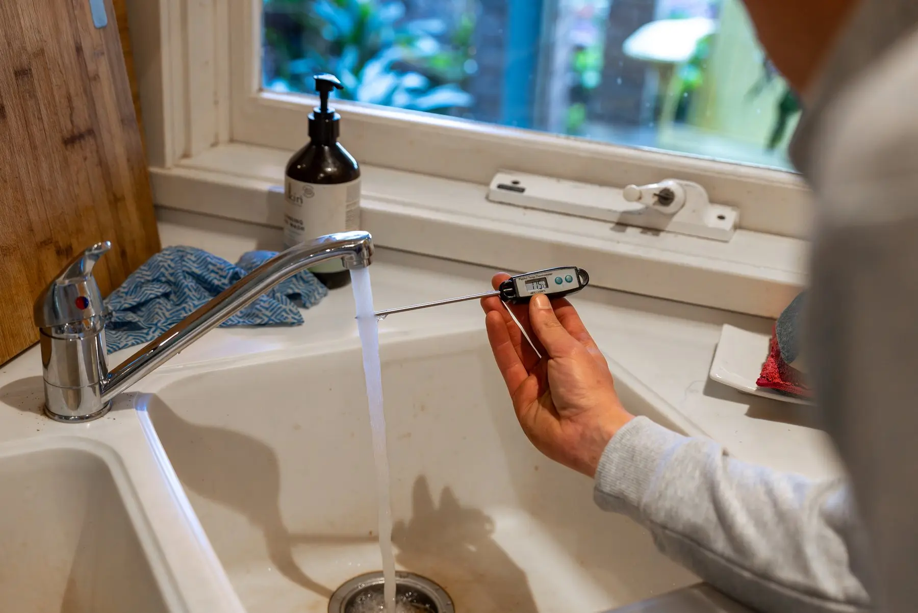 Hot water running from a kitchen tap