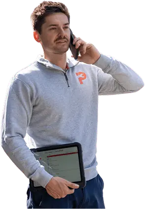 Pat from Plumbwell Plumbing Services taking a call